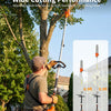A man operating an extended reach pole saw for tree trimming in a yard.