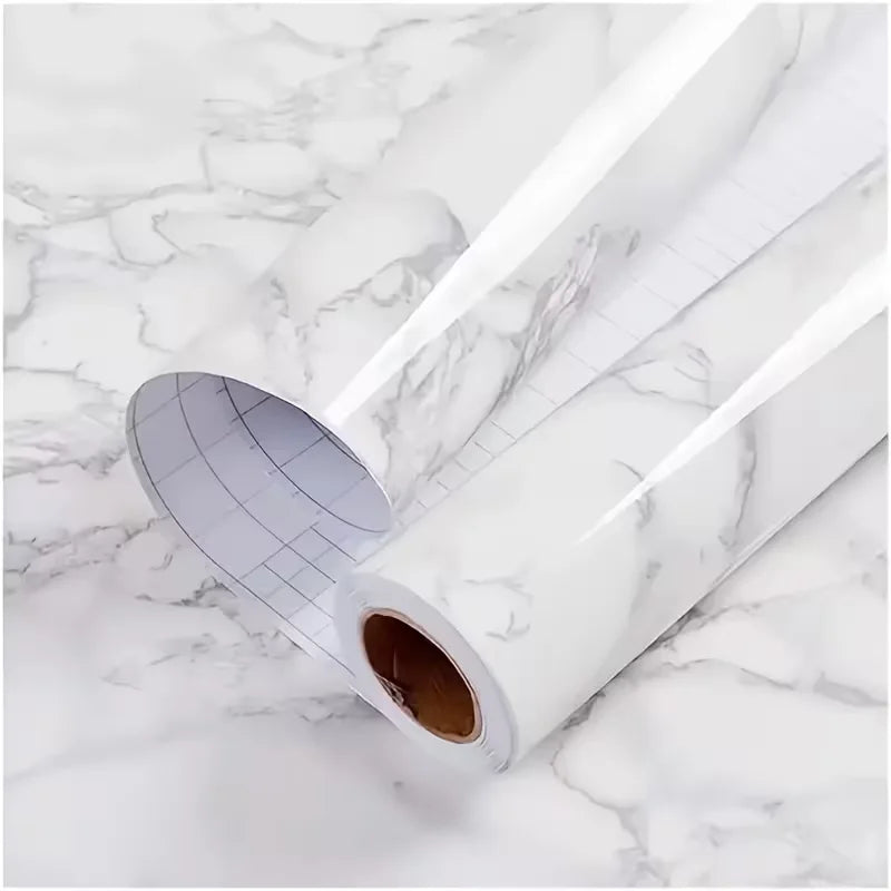 Roll of pearlescent PVC self-adhesive wall stickers for home decor shown on a marble surface.
