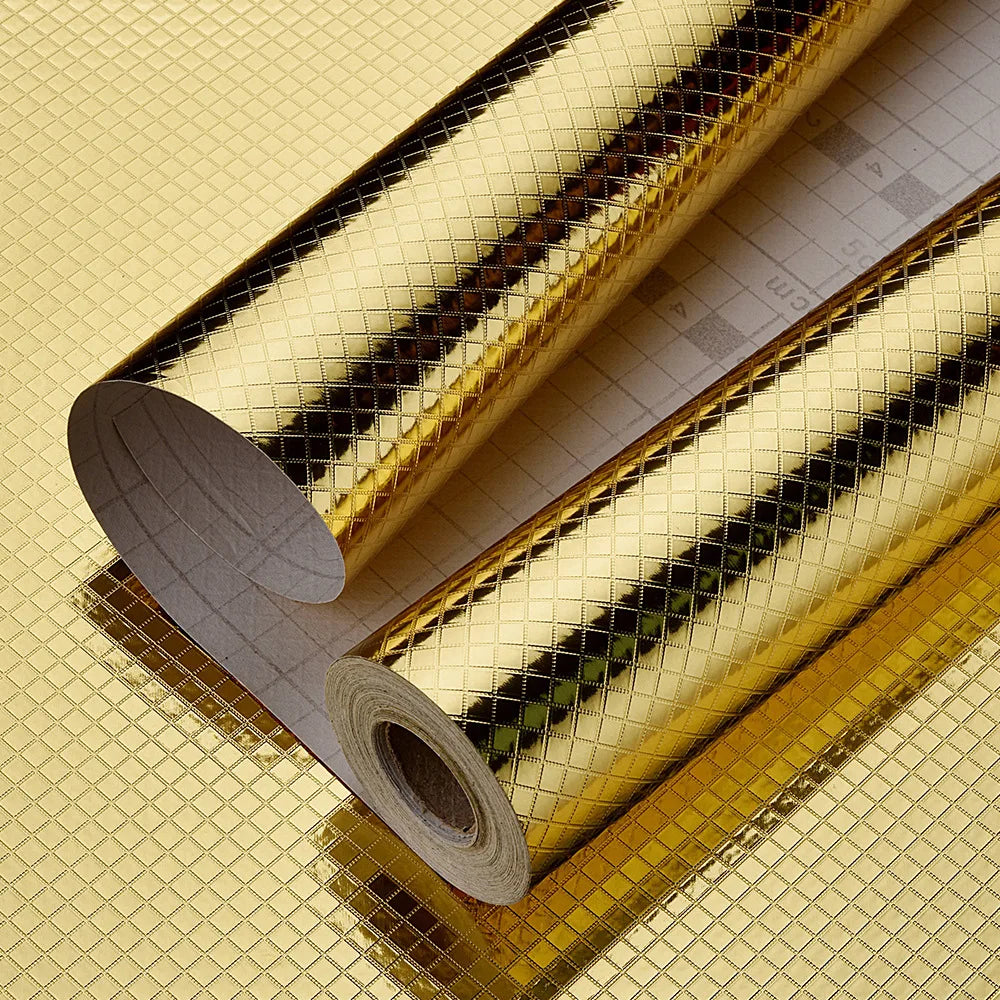 Roll of self-adhesive aluminum foil wall decals showing a textured surface and a rolled edge.