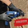 A hand wearing blue heavy-duty anti-cut work gloves is holding a blue tool.