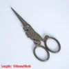 Vintage floral embroidery tailor scissors with a silhouette of a cat and a pointed blade