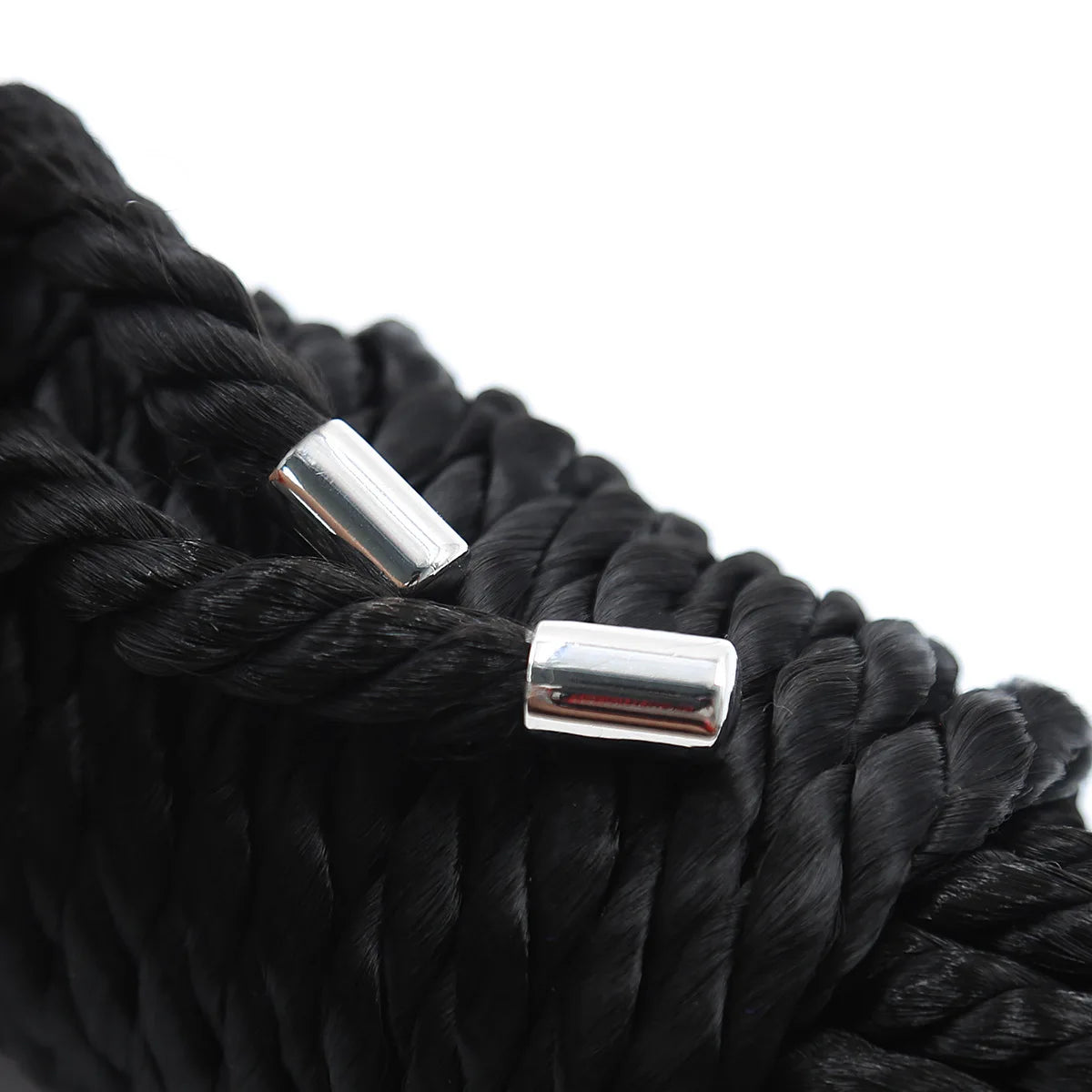 Silver metal connectors attached to a black braided rope for bondage or roleplay