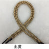A bundle of multi-color polypropylene gift wrapping rope tied in an 'X' shape.