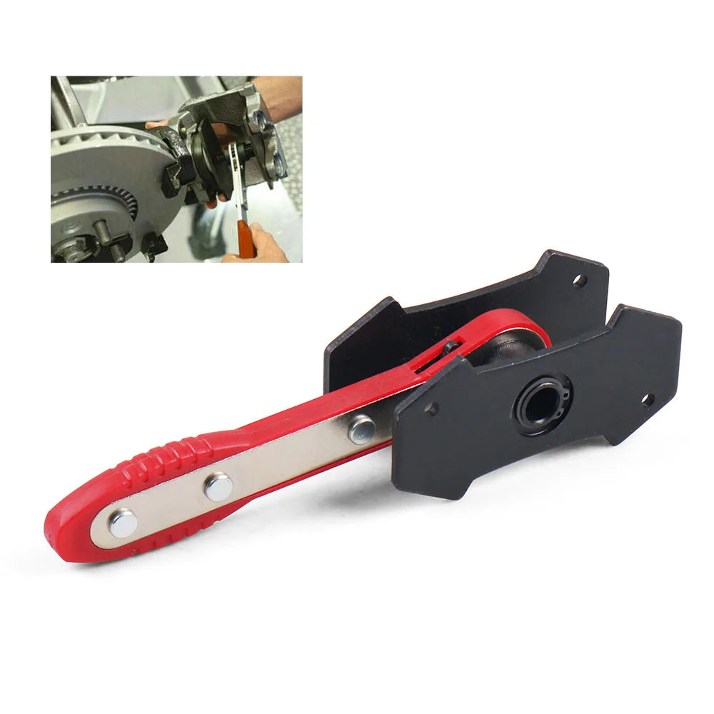 A precision car ratchet brake piston spreader tool with a red handle and black metal body.