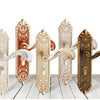 A set of ornate European style gold door locks with keys displayed against a white background.