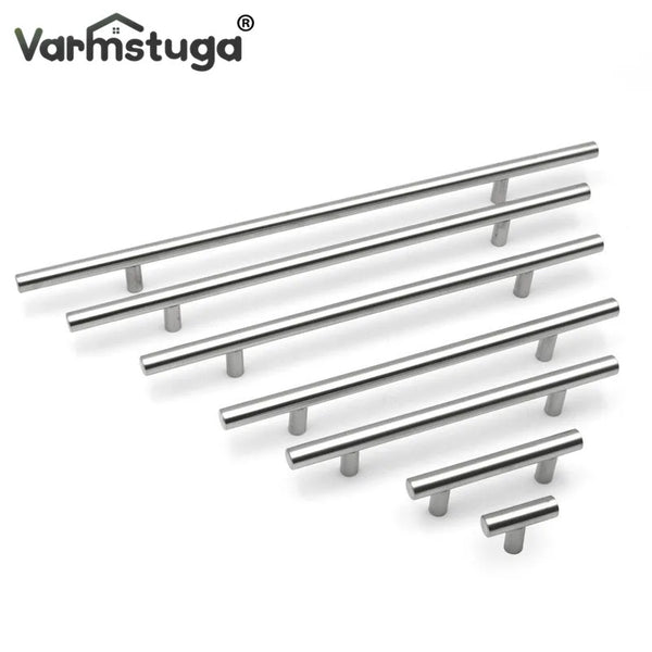 Modern stainless steel cabinet pull knobs in a horizontal row.