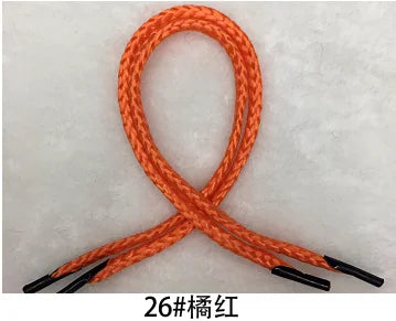Orange polypropylene gift wrapping rope shown in a crisscross pattern.