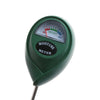 A green digital soil moisture meter with a dial showing dry, moist, and wet levels.