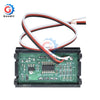 A green electronic circuit board with wires and components, likely a digital DC voltmeter gauge for automotive.