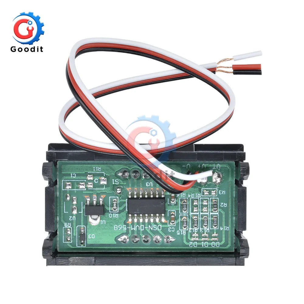 A green electronic circuit board with wires and components, likely a digital DC voltmeter gauge for automotive.