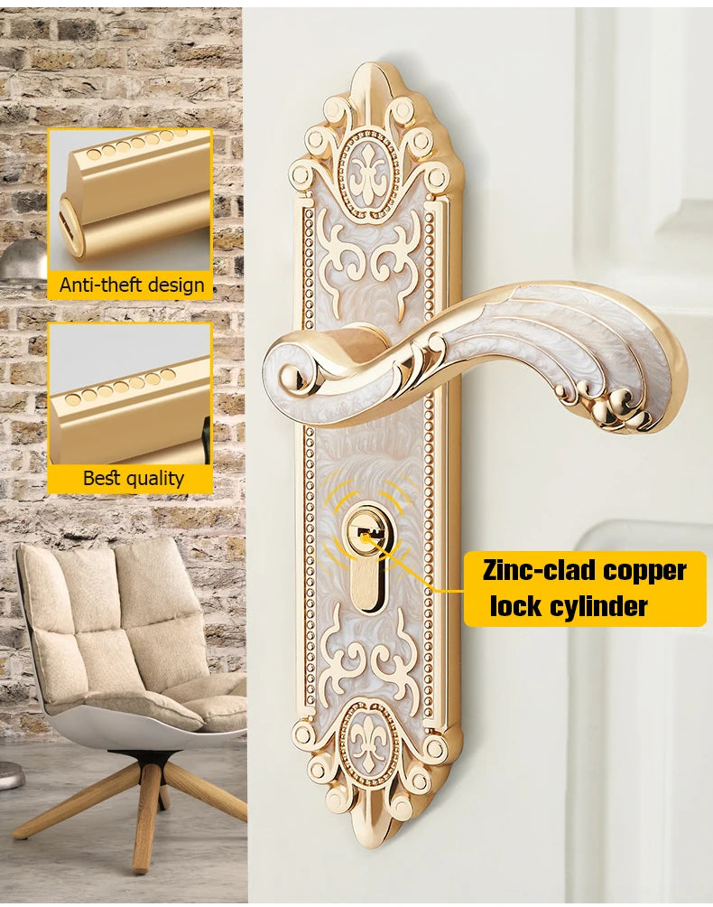 A close-up of a European style gold door lock with keys mounted on a white wall.
