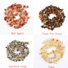 Four types of natural stone beads: Red Agate, Tiger Eye Stone, Speckled stone, and Topaz.