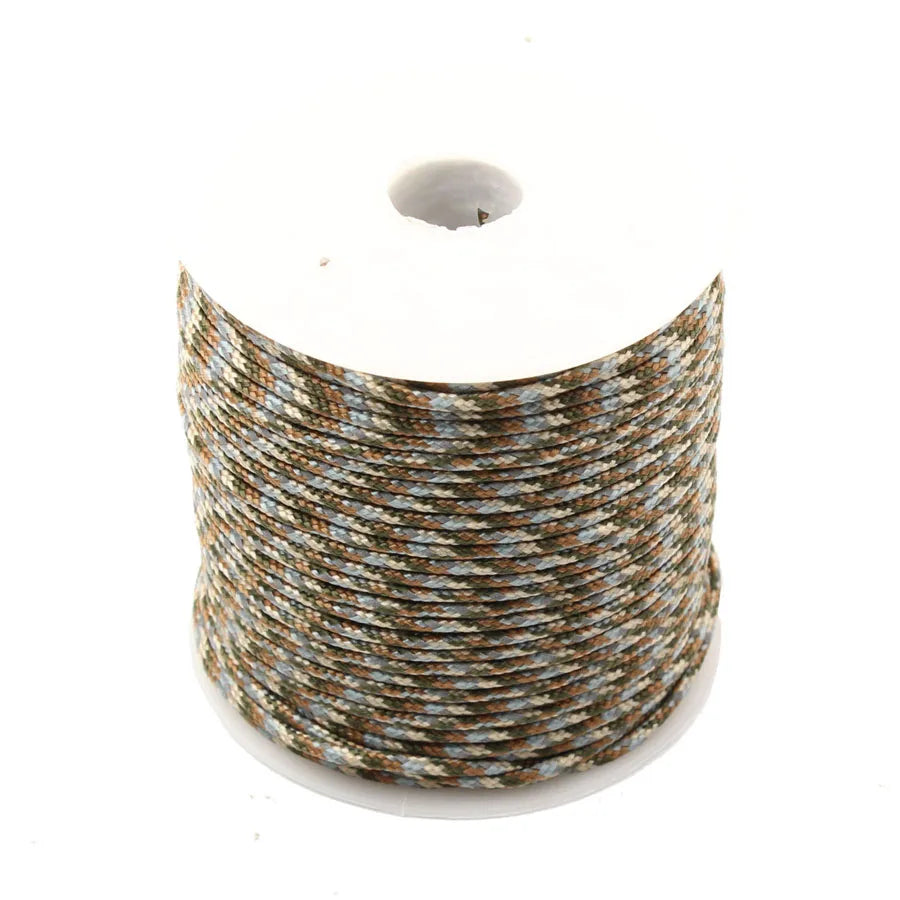 A coil of durable 2mm reflective paracord rope in shades of brown and blue.