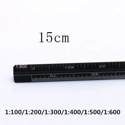 A black aluminum ruler showing a scale marked 15cm and various ratios like 1:100 to 1:600.