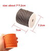 A spool of dark gray reflective paracord rope with dimensions about 7x7.2cm.