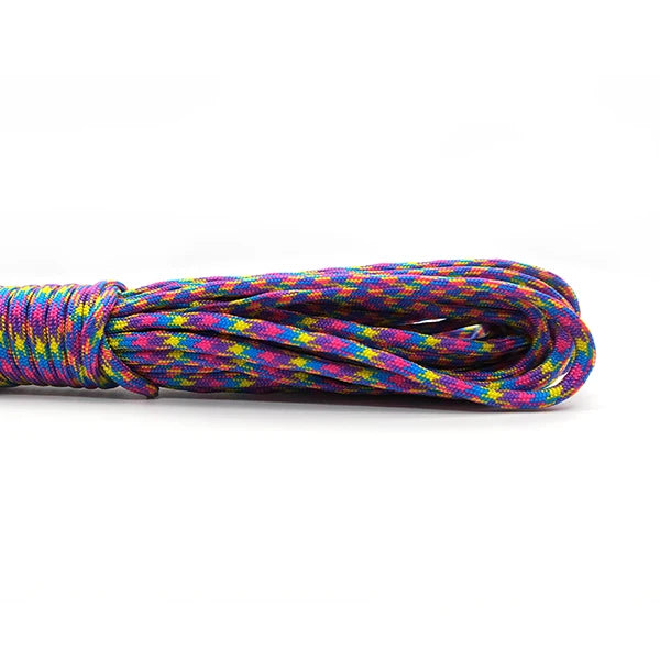 A coil of heavy duty 7-strand paracord rope in vibrant multi-colored strands.