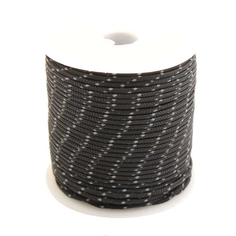 A coil of black durable 2mm reflective paracord rope.