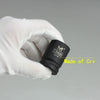 A hand wearing a white glove holds a black point impact socket labeled 19mm Cr-V.