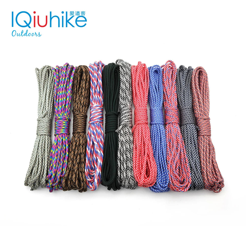 A collection of various colored heavy duty paracord ropes displayed horizontally.