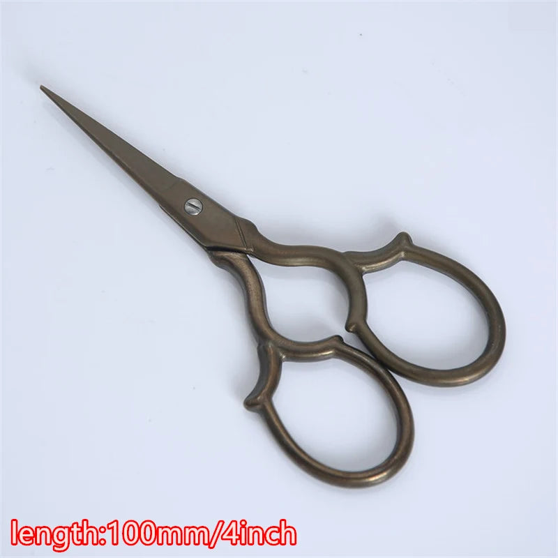 Vintage floral embroidery tailor scissors with a 100mm blade and antique bronze handles