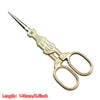 Vintage floral embroidery tailor scissors with a pointed tip and gold-colored handles