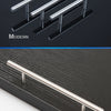 Modern stainless steel cabinet pull knobs shown in two styles against a dark background and on a cabinet door.