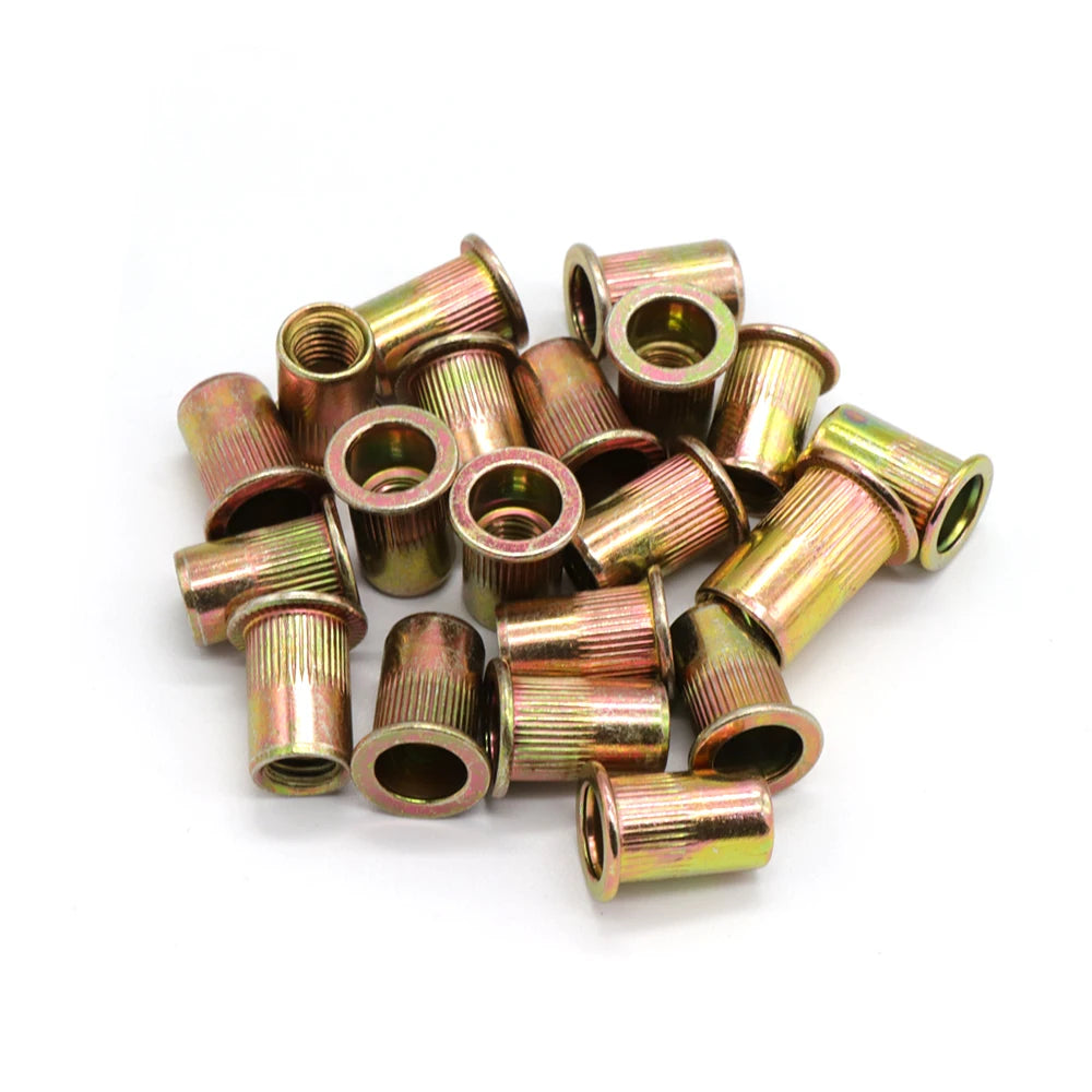 A collection of zinc-plated precision rivet nuts ranging in size from M3 to M12.