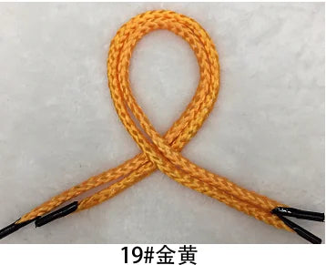 A piece of 19# gold thread or rope, orange in color, tied into a figure-eight shape.