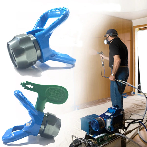 A blue airless paint sprayer tip guard nozzle seat and a green tool are shown next to a painted wall.