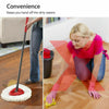 A woman mops a floor with a red microfiber mop and yellow cleaning cloths.