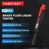 A red and black portable digital brake fluid tester with a probe and indicator lights.