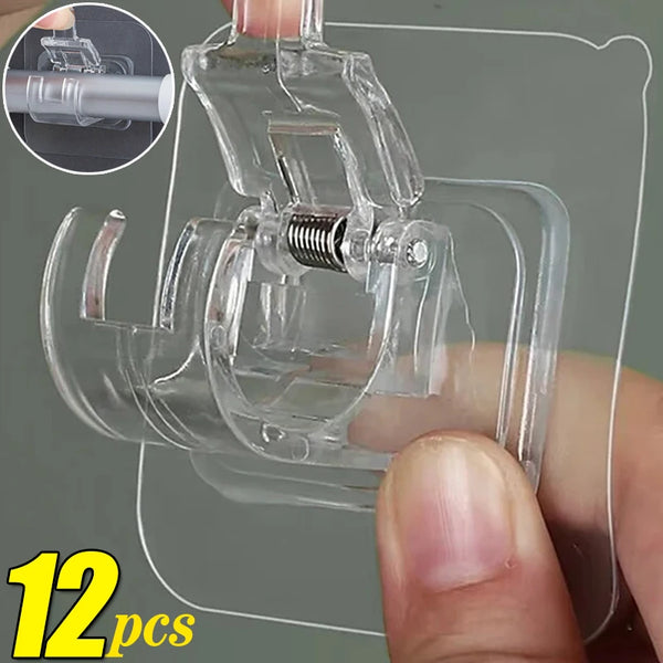 Crochets auto-adhésifs en plastique transparents pour tringles de rideaux et rangement domestique, appliqués sur une surface.