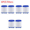 Six white cylindrical filters with blue caps and bases for water filtration.