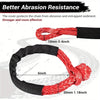 Red synthetic winch rope with black coating shown in a twisted form, demonstrating better abrasion resistance.
