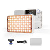A compact white light panel with multiple circular LEDs and an accompanying camera module.