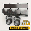 A black heavy-duty metal tool storage rack with two 66lb weights mounted for testing.