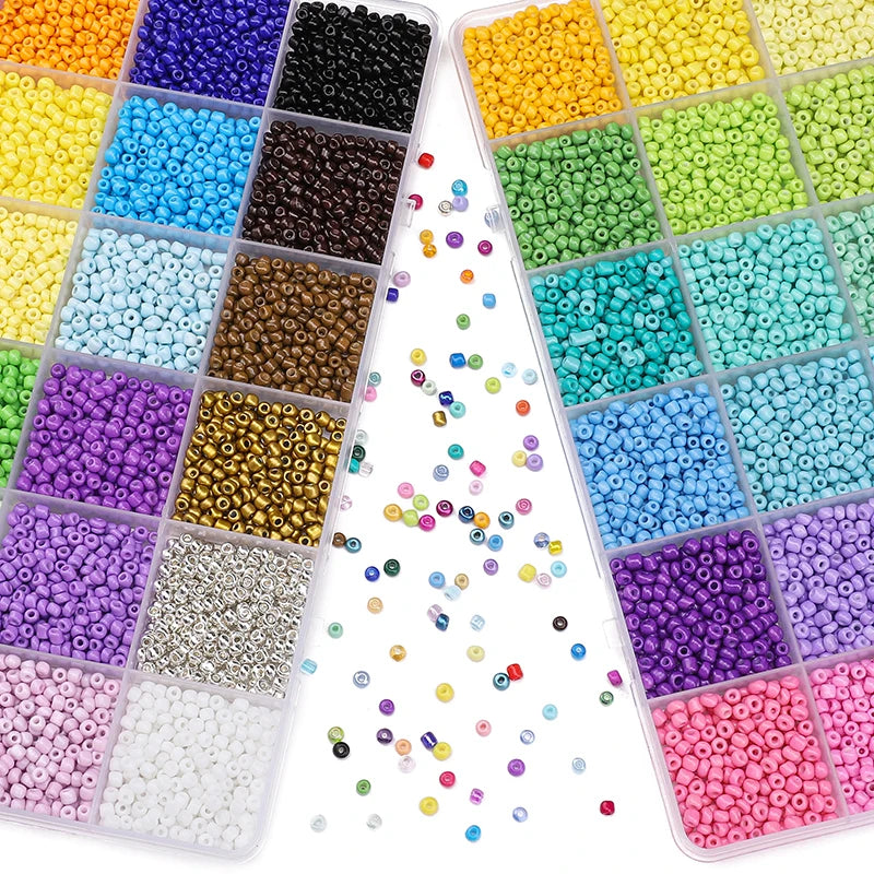 A variety of colorful acrylic rice beads in various shades and sizes are displayed in small compartments.