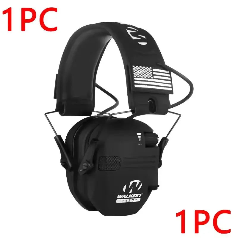 A single black professional noise reduction ear muff with an American flag patch and attached audio equipment.