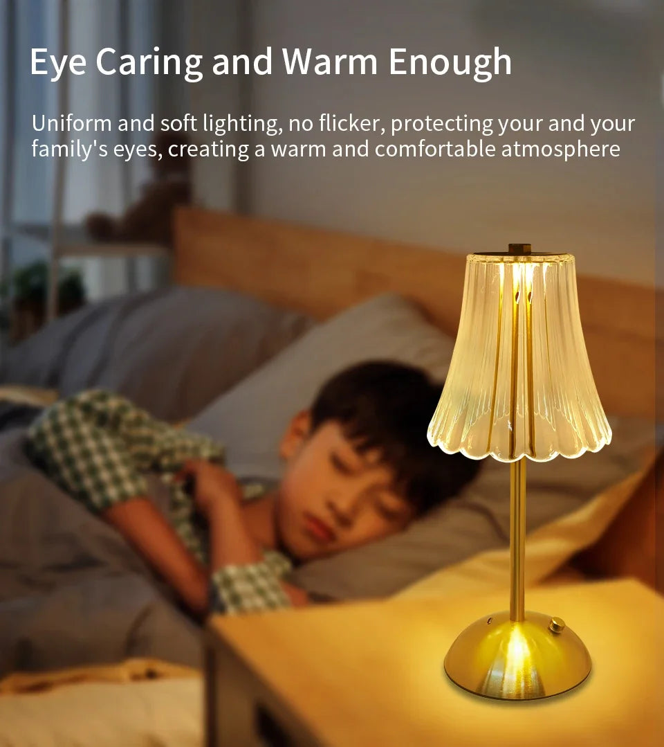 A warm-toned touch sensor desktop reading lamp illuminates a bedside area.