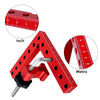 A red precision right angle fixing clamp shown with inch and metric rulers for measurement.