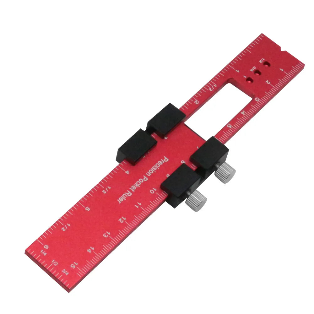 A red precision aluminum woodworking ruler with black markers and markings.