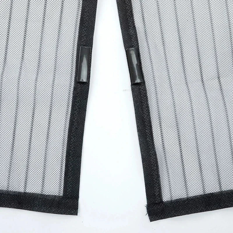 A pair of black insect proof door screen netting panels.