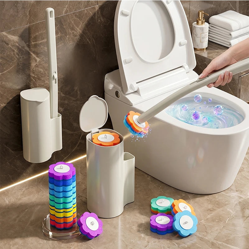A white toilet brush set featuring a wall-mounted brush, a stand, and several small cleaning tools on a marble countertop.