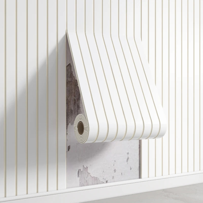 A roll of white 3D stereo concave-convex wall decal sticker is mounted on a white paneled wall.