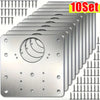 A set of stainless steel cabinet hinge mounting plates and screws for installation.