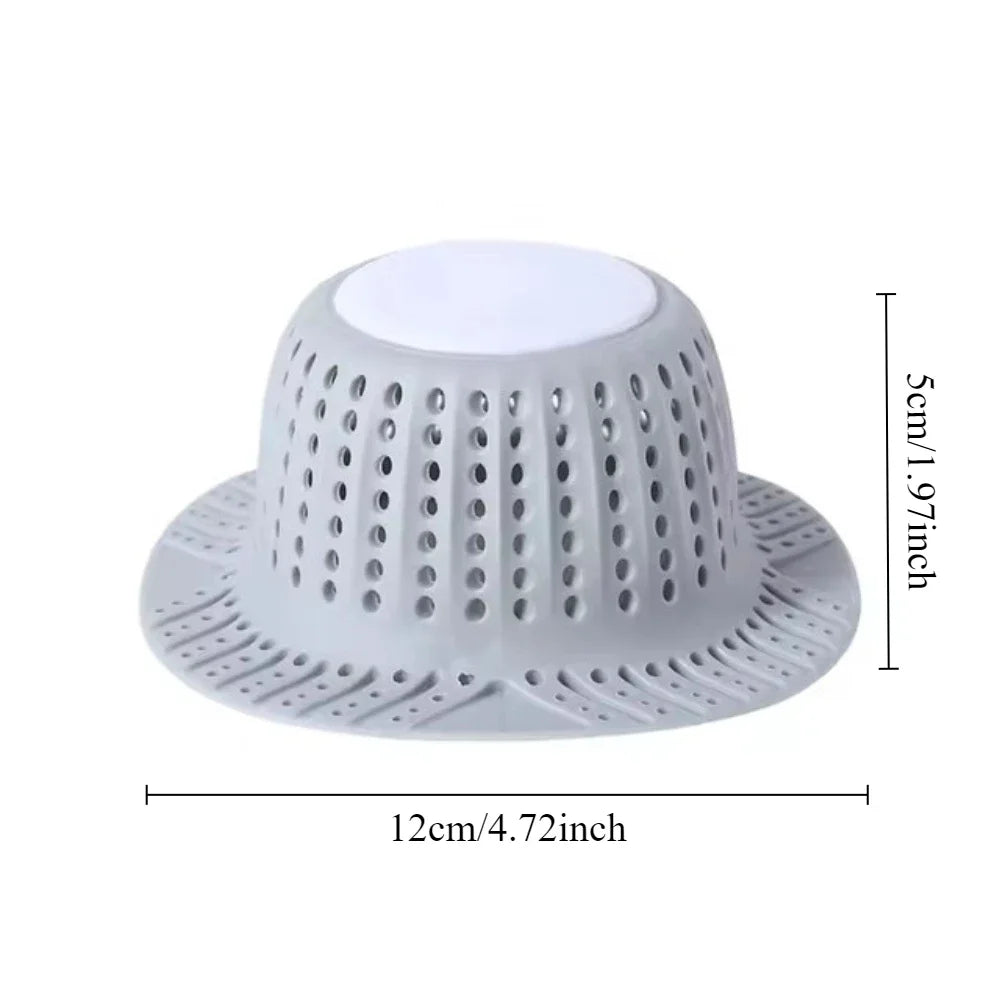 A white collapsible bathtub drain hair catcher protector with a perforated dome and wide base.