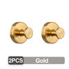 A pair of gold stainless steel suction cup hooks for bathroom and shower.