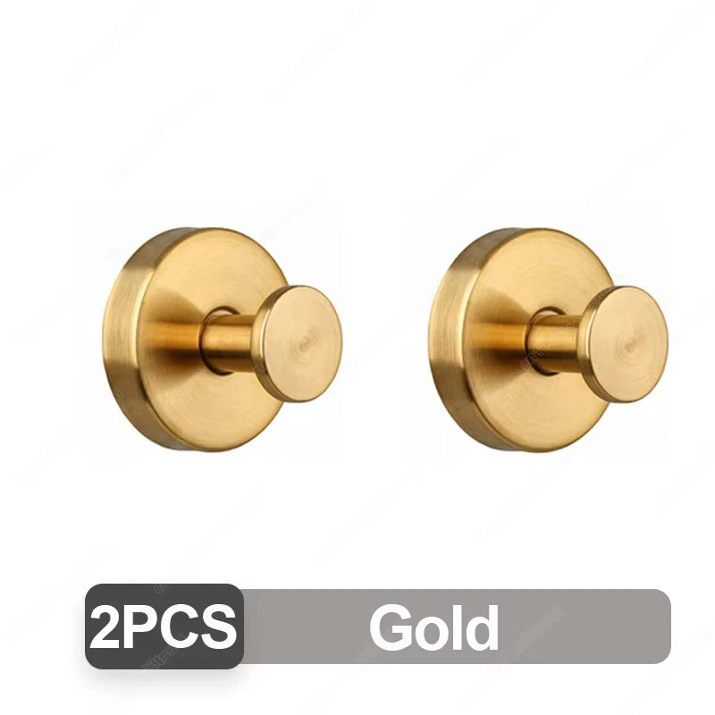 A pair of gold stainless steel suction cup hooks for bathroom and shower.