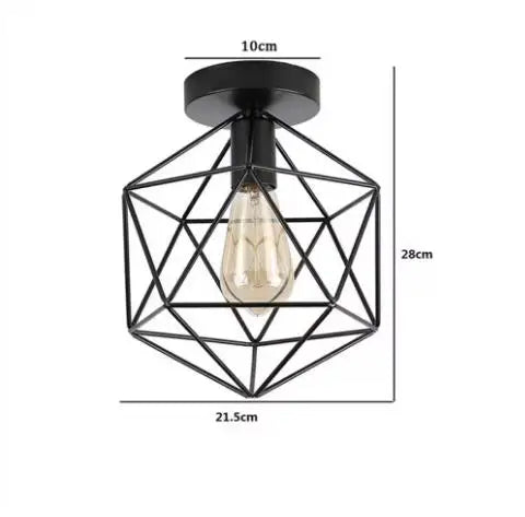 Black geometric wire frame chandelier lamp with an exposed clear light bulb.