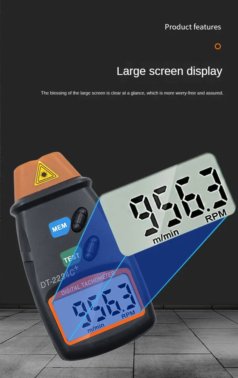 A digital non-contact laser tachometer speed meter displaying 9563 RPM on a dark gray device.